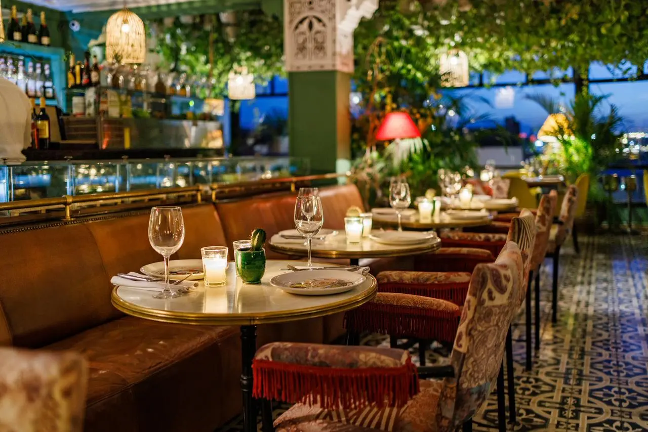 Rooftop dining with panoramic views over the Marrakech Medina at Le Salama